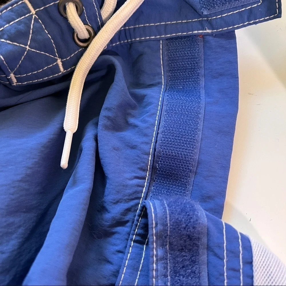 POLO RALPH LAUREN Swimwear. Blue w/cargo pocket, side pockets & key pocket. M